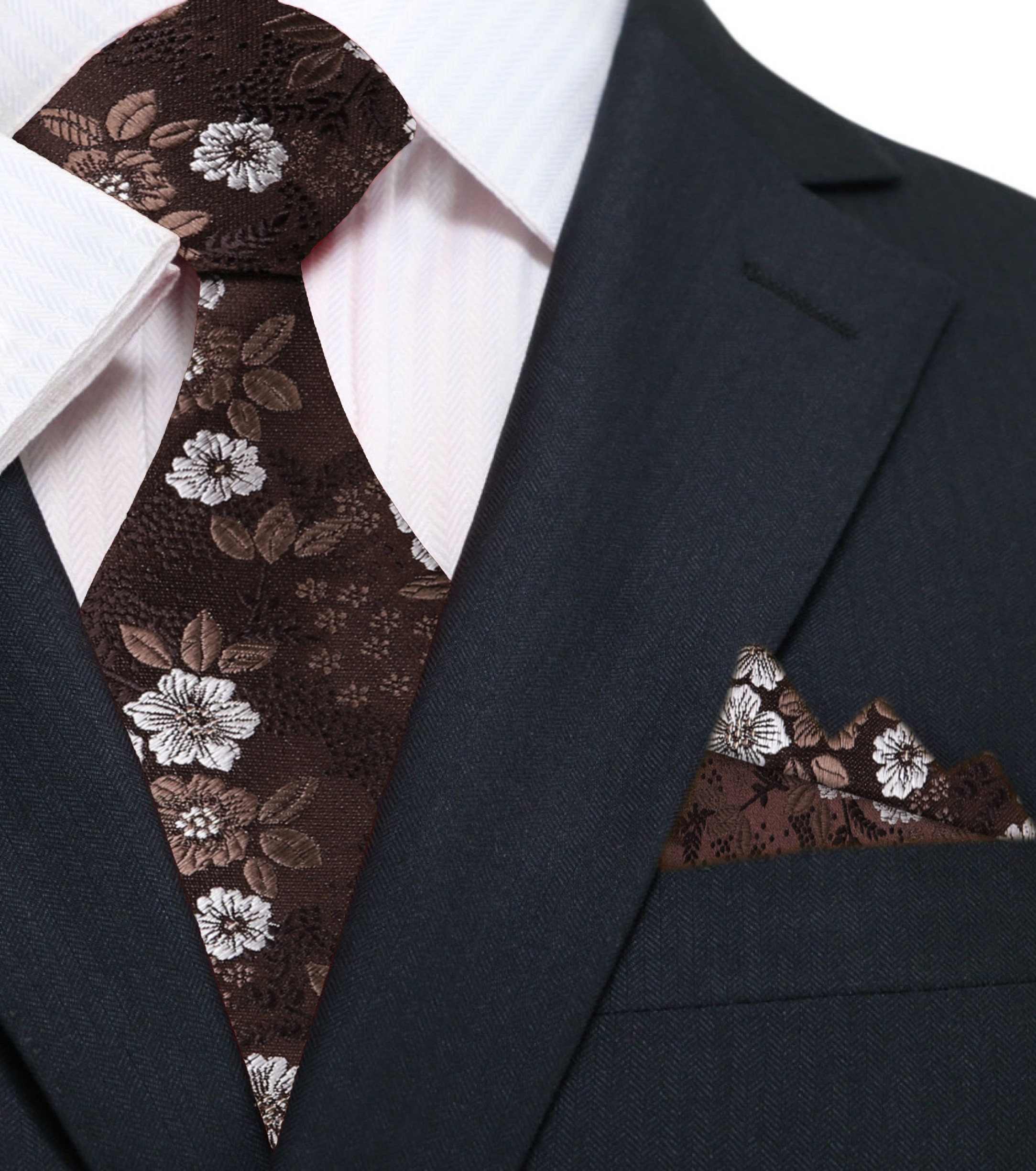 Man wearing floral necktie with a white shirt and navy suit for a wedding