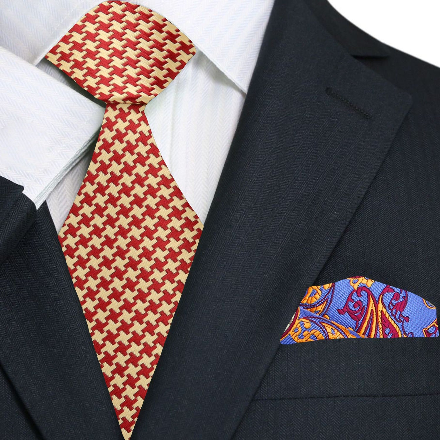Man wearing a gold patterned necktie with navy suit