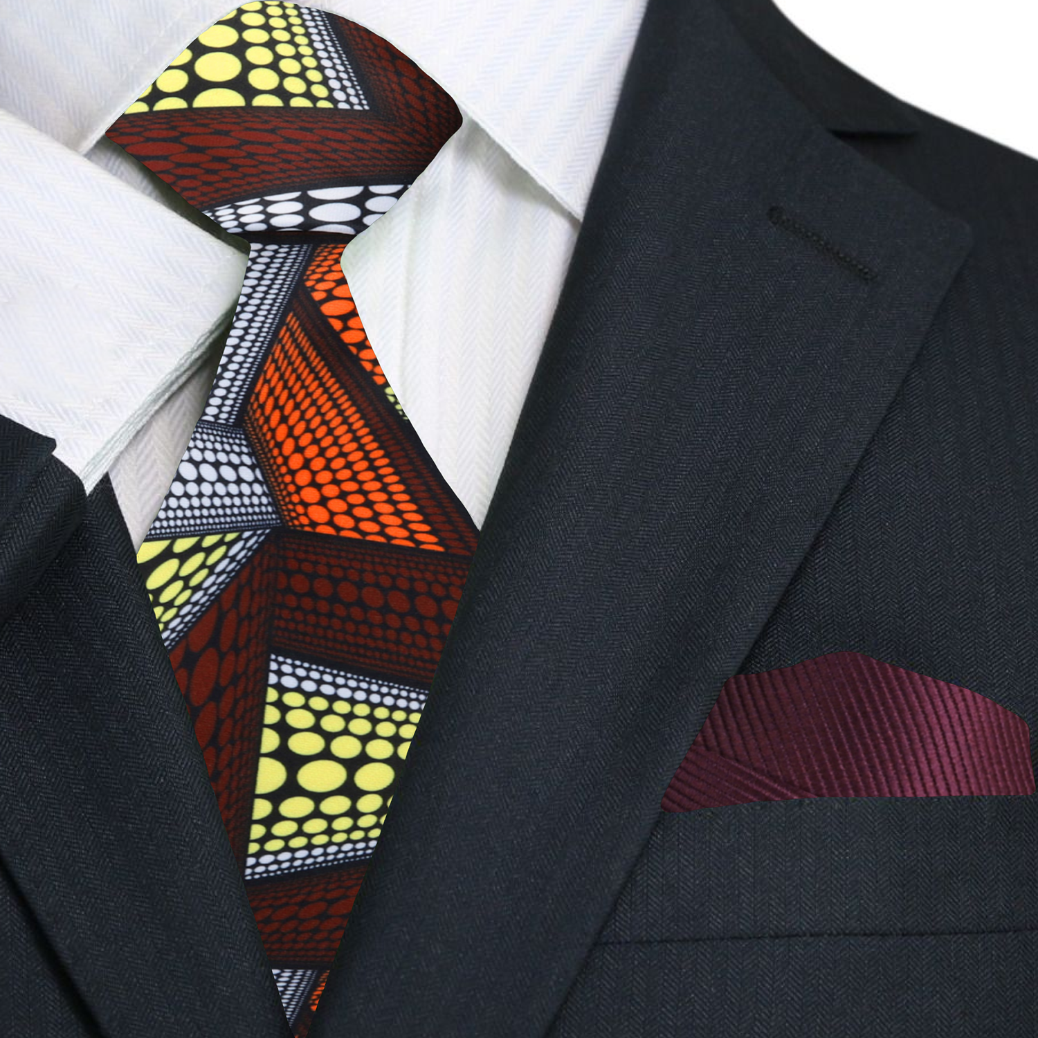 Detail shot of geometric Kente inspired design on a luxurious silk necktie