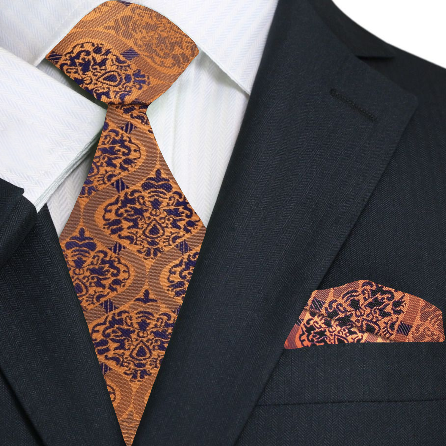 Model wearing the Abstract Copper and Blue Silk Tie paired with a charcoal gray suit and white dress shirt.