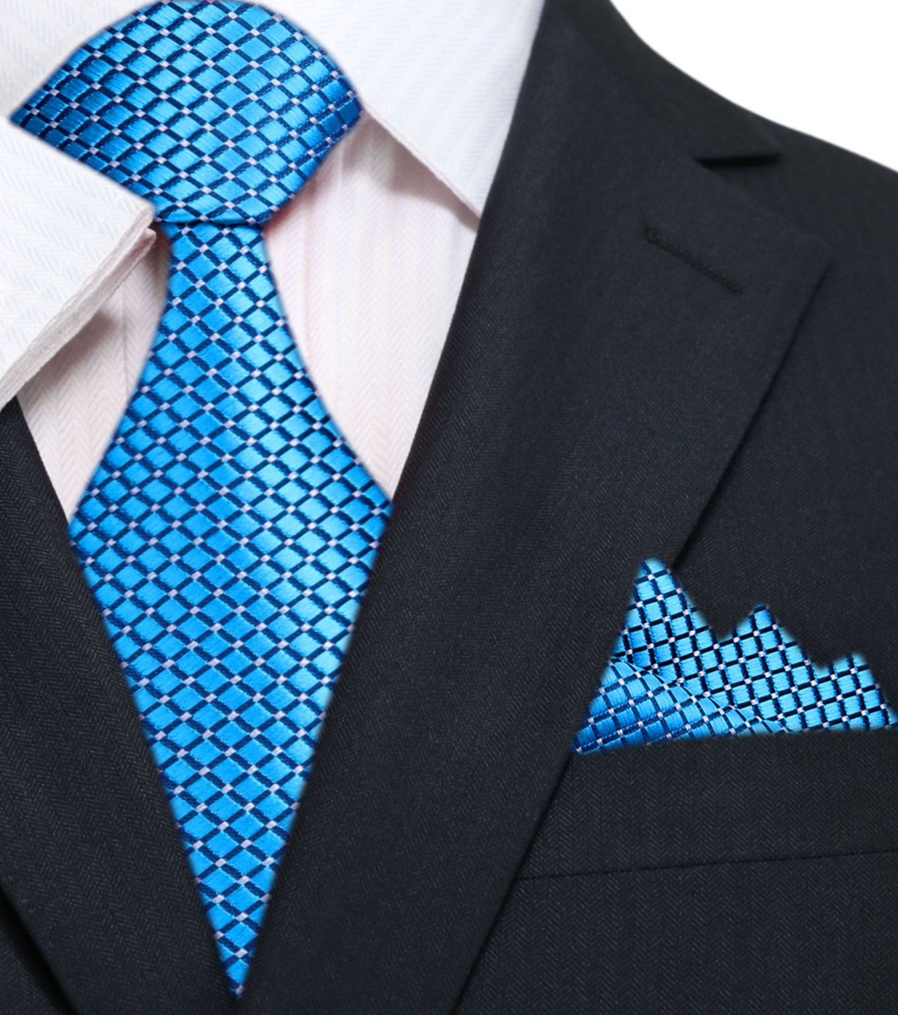 Silk tie with geometric pattern and metallic finish draped over a suit