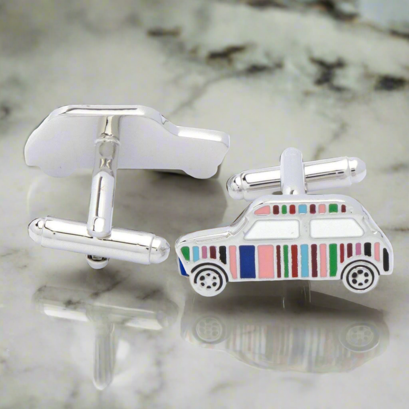 Vintage car cufflinks with a light grey suit, showcasing a sophisticated look.
