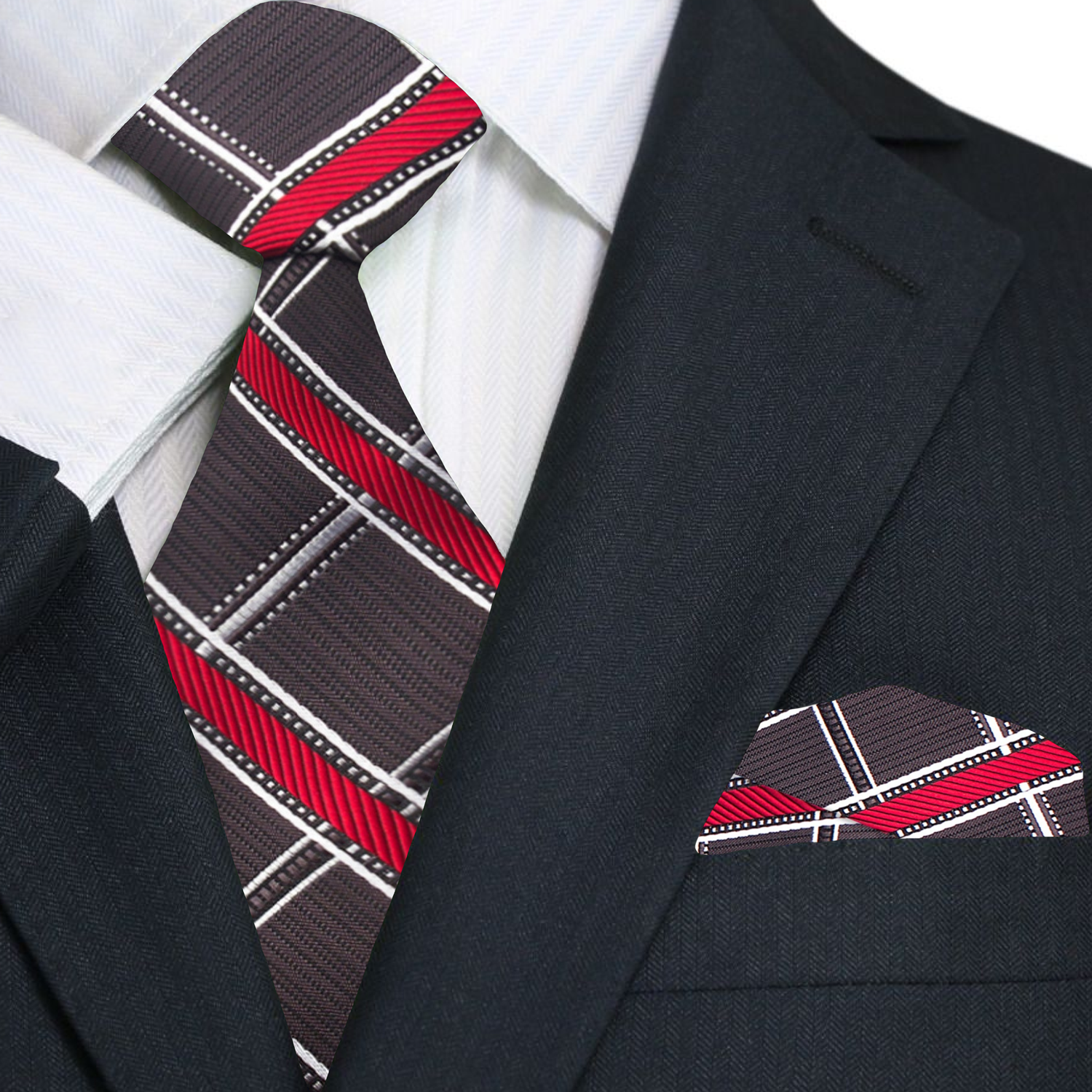 Man tying a plaid silk necktie in a professional setting for a business meeting