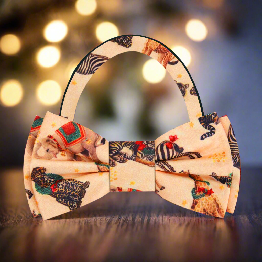Side angle featuring the bow tie with a navy suit, showcasing best holiday bow ties for parties.