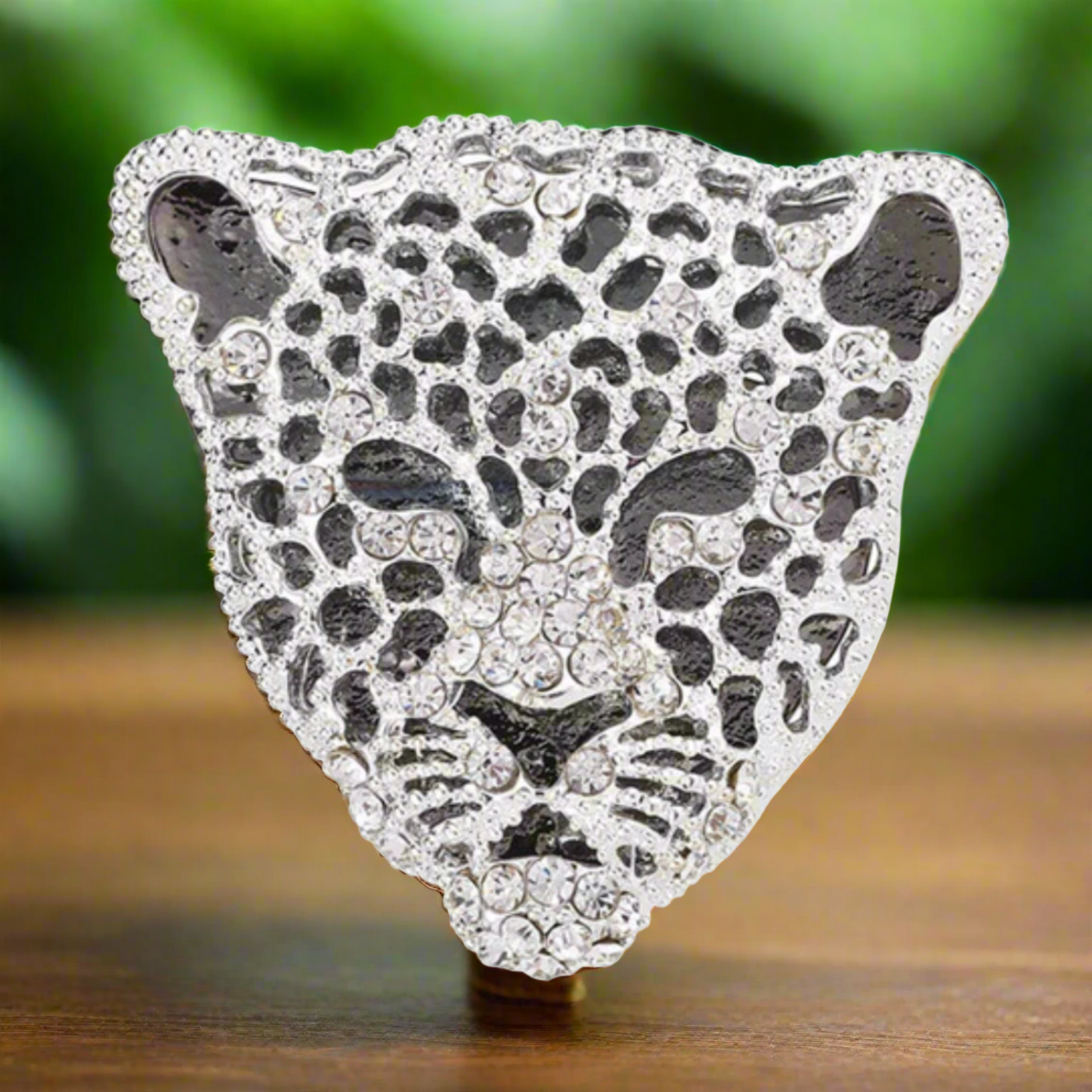Close-up of a gemstone exotic animal pin with vibrant colors, ideal for fashion accessories and gifts