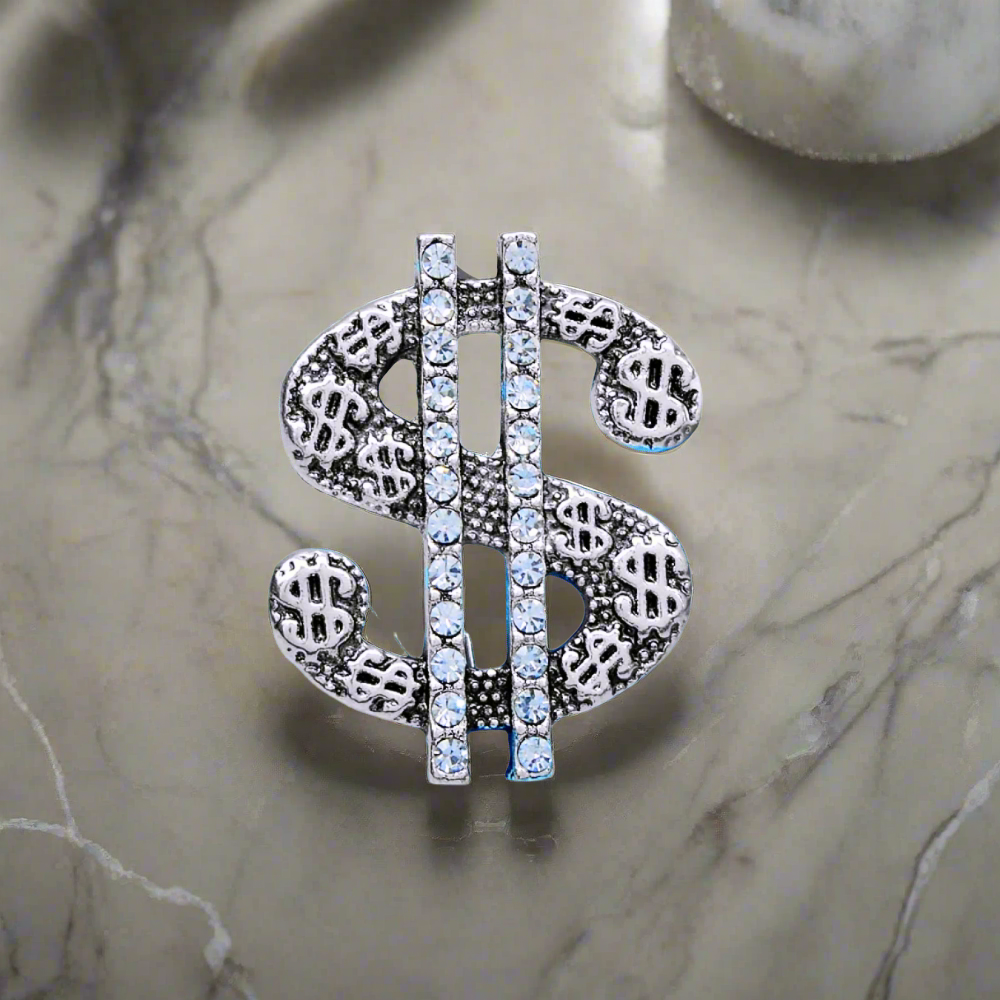 Close-up of the rhinestone pin, showcasing the intricate detailing and shimmering effect.