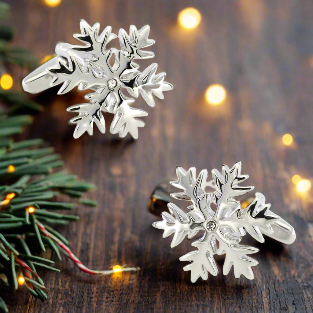 Man wearing snowflake cufflinks with a navy suit for formal event