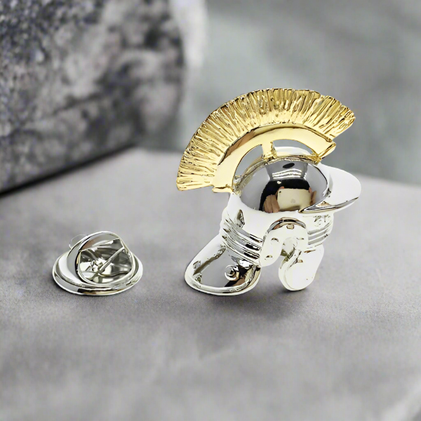 Fashionable man wearing the Roman helmet lapel pin at a cultural exhibition