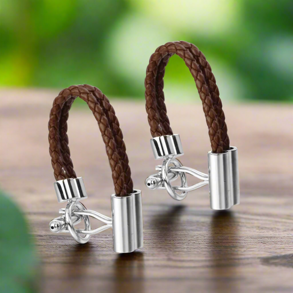 Close-up of stylish cable cufflinks in blue with rope design for men's formal wear