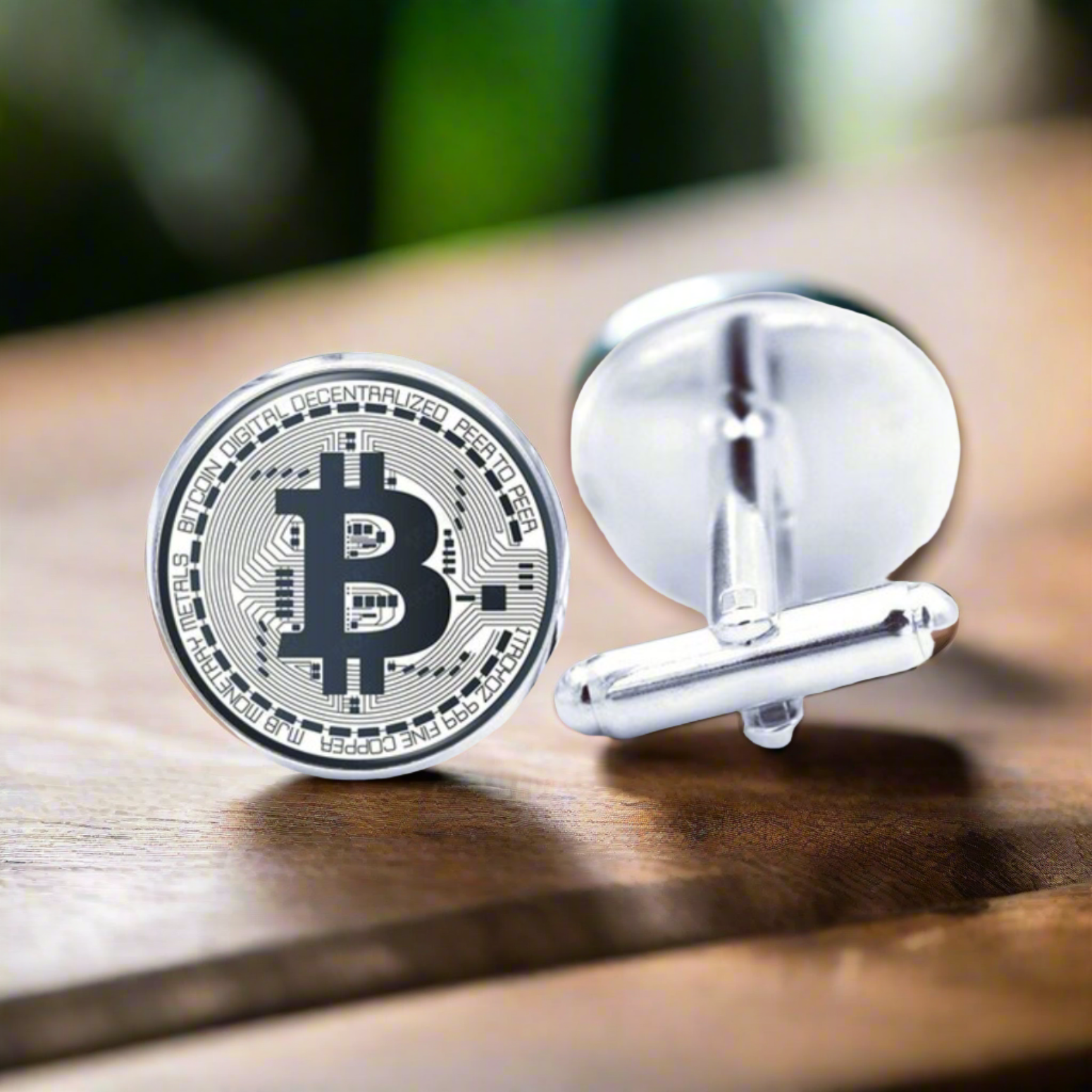Close-up of Bitcoin cufflinks against a navy blue suit, highlighting their versatility and style.