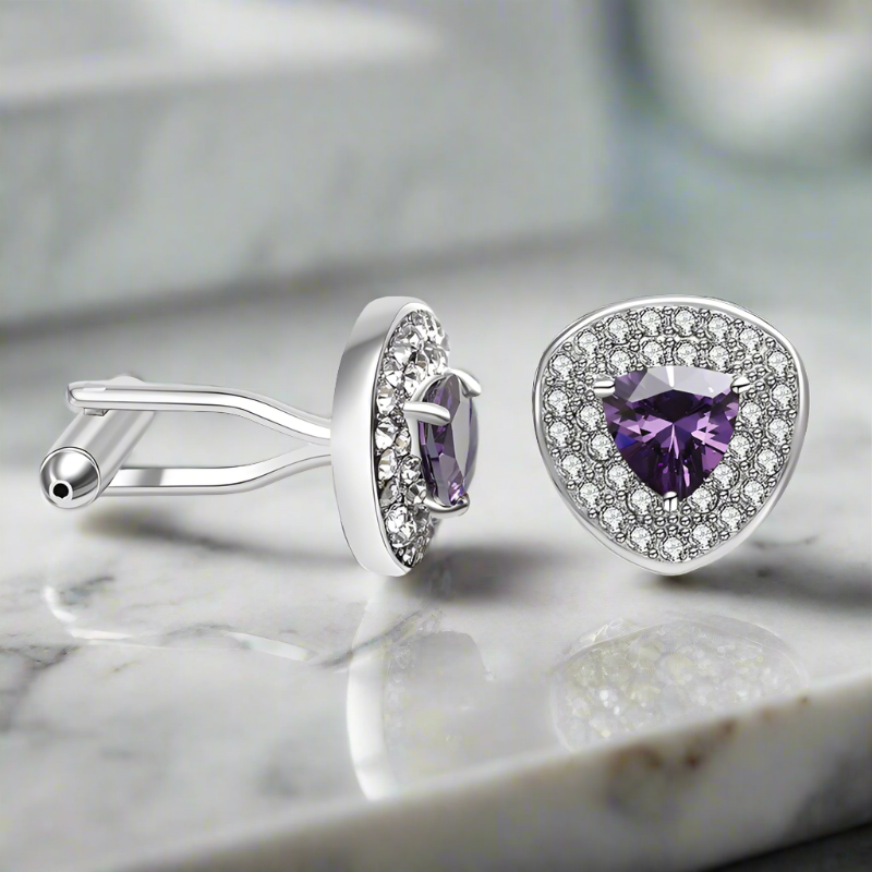 Silver cufflinks with black stones, designed for a stylish look.
