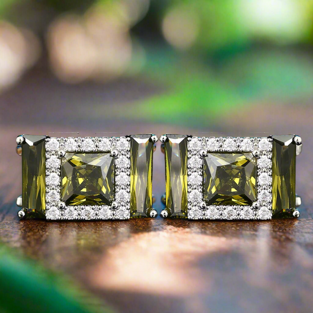 Chrome gemstone cufflinks with yellow green stones, ideal for a stylish look.