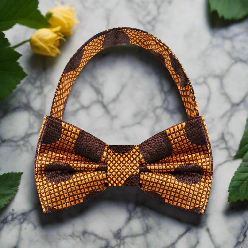 Copper bow tie with pocket square, styled for a rustic wedding or autumn dinner party.