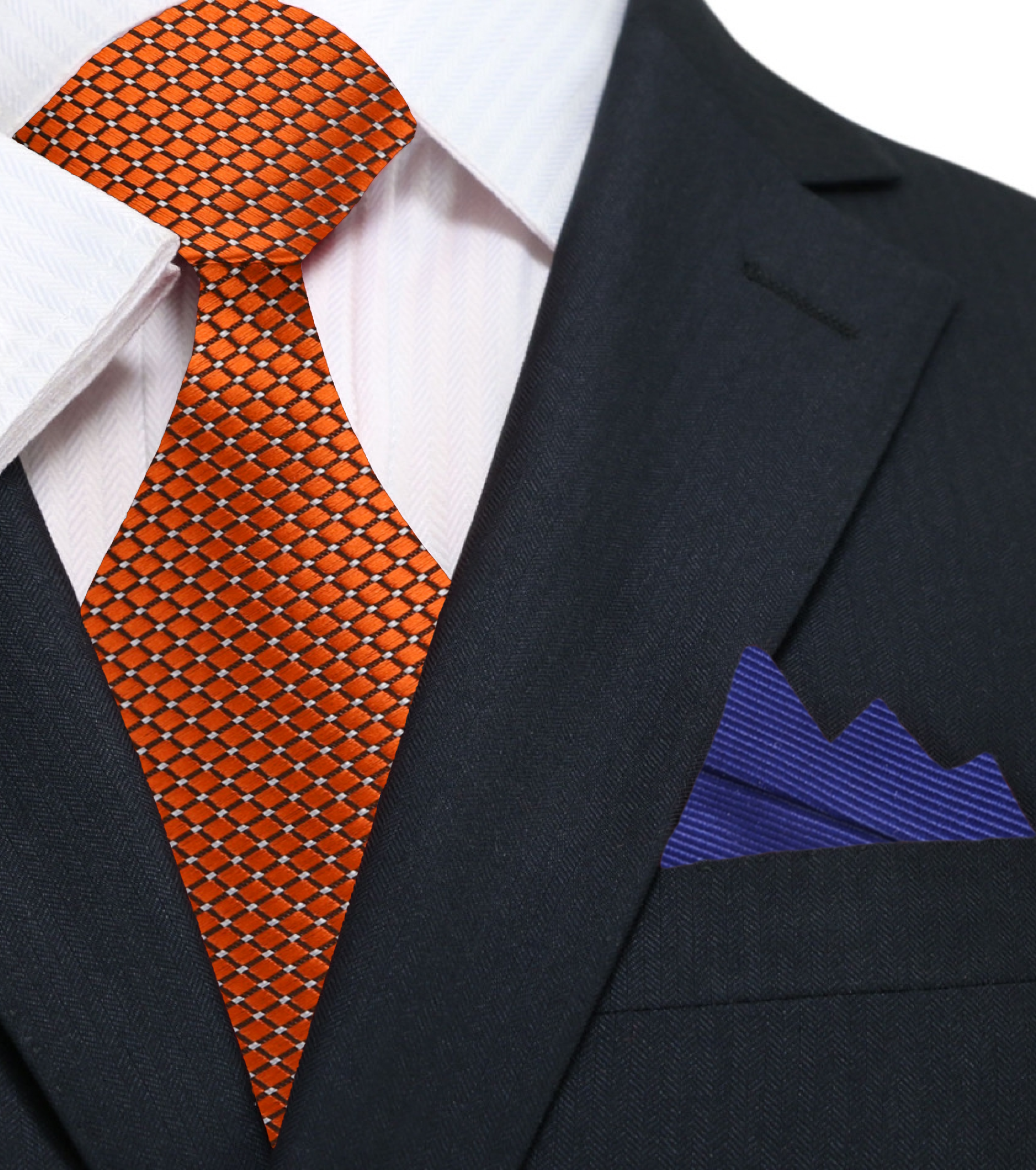 Man wearing navy suit with rust orange silk necktie for formal event