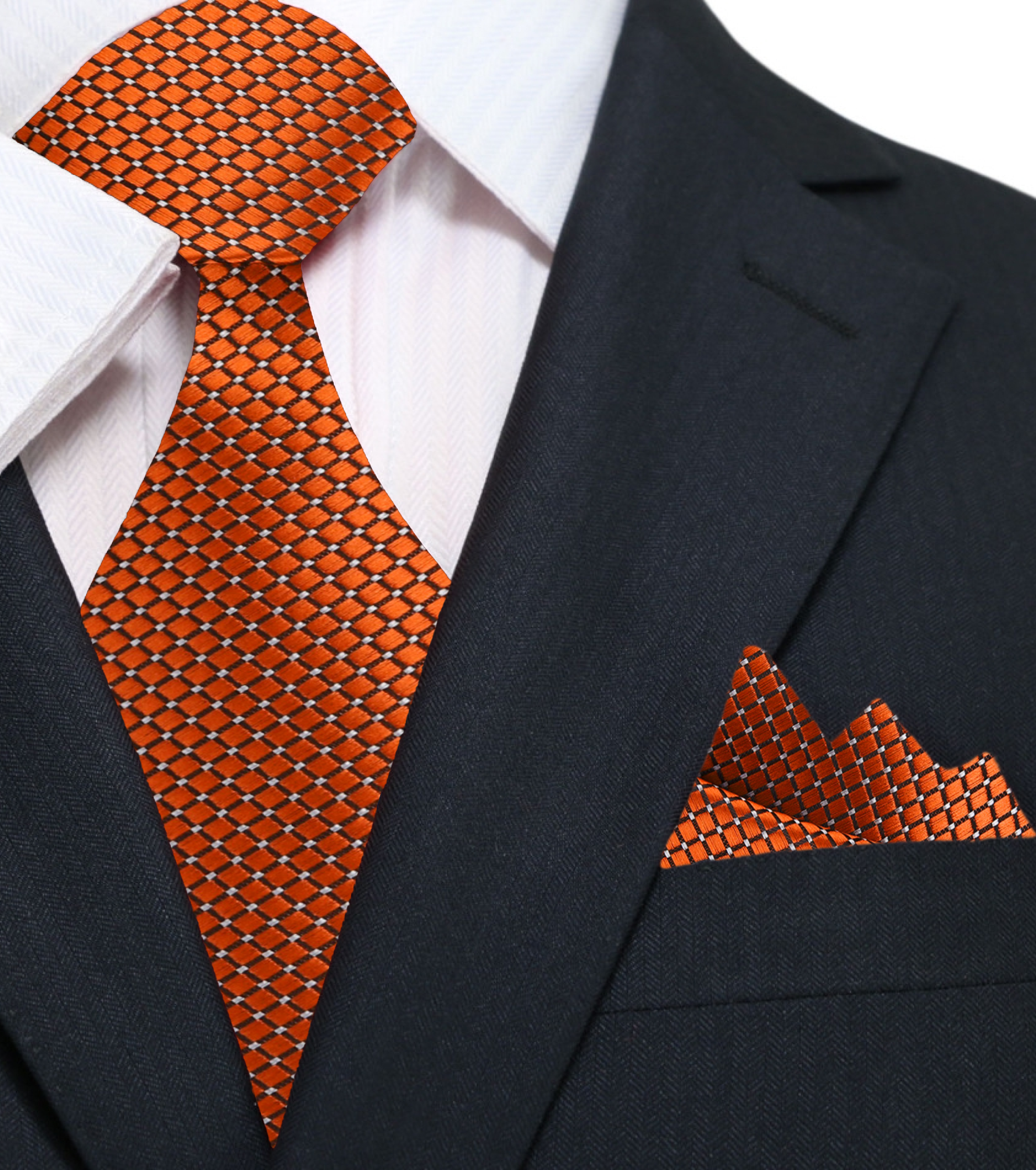 Man wearing navy suit with rust orange silk necktie for formal event