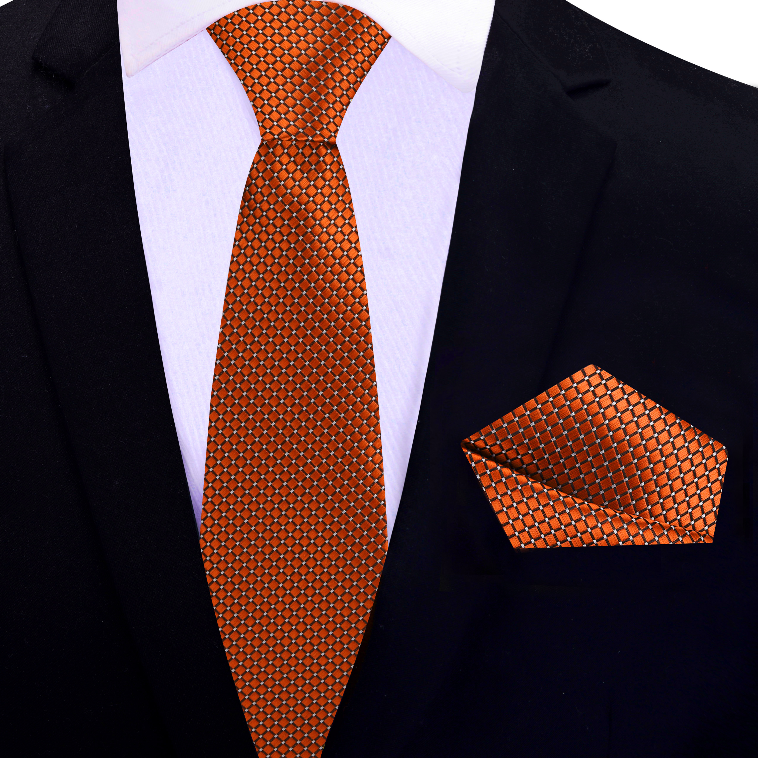 Matching rust orange tie with pocket square set for wedding or business meeting