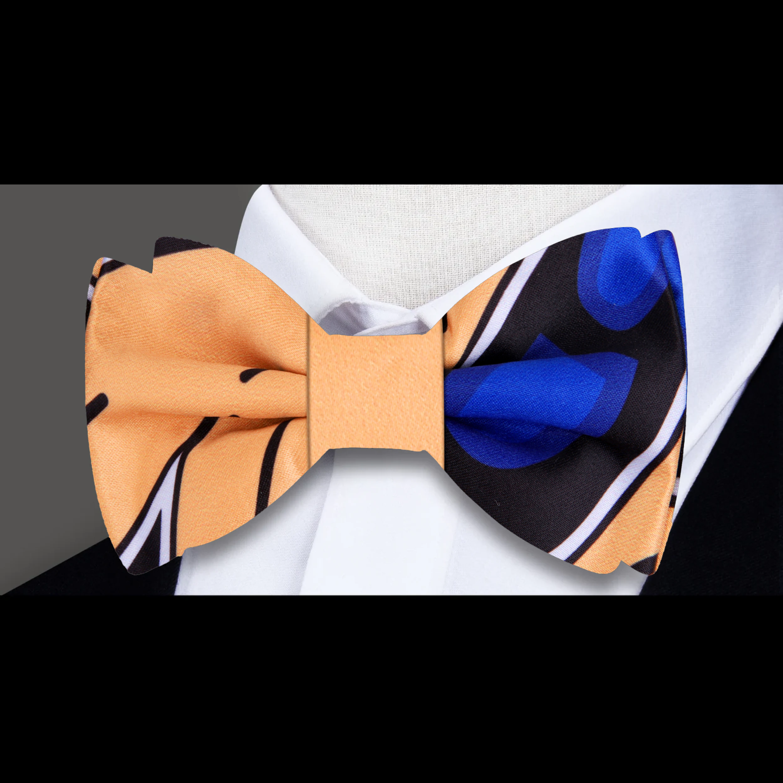 Close-up of the elegant paisley bow tie showcasing its intricate pattern and colors.