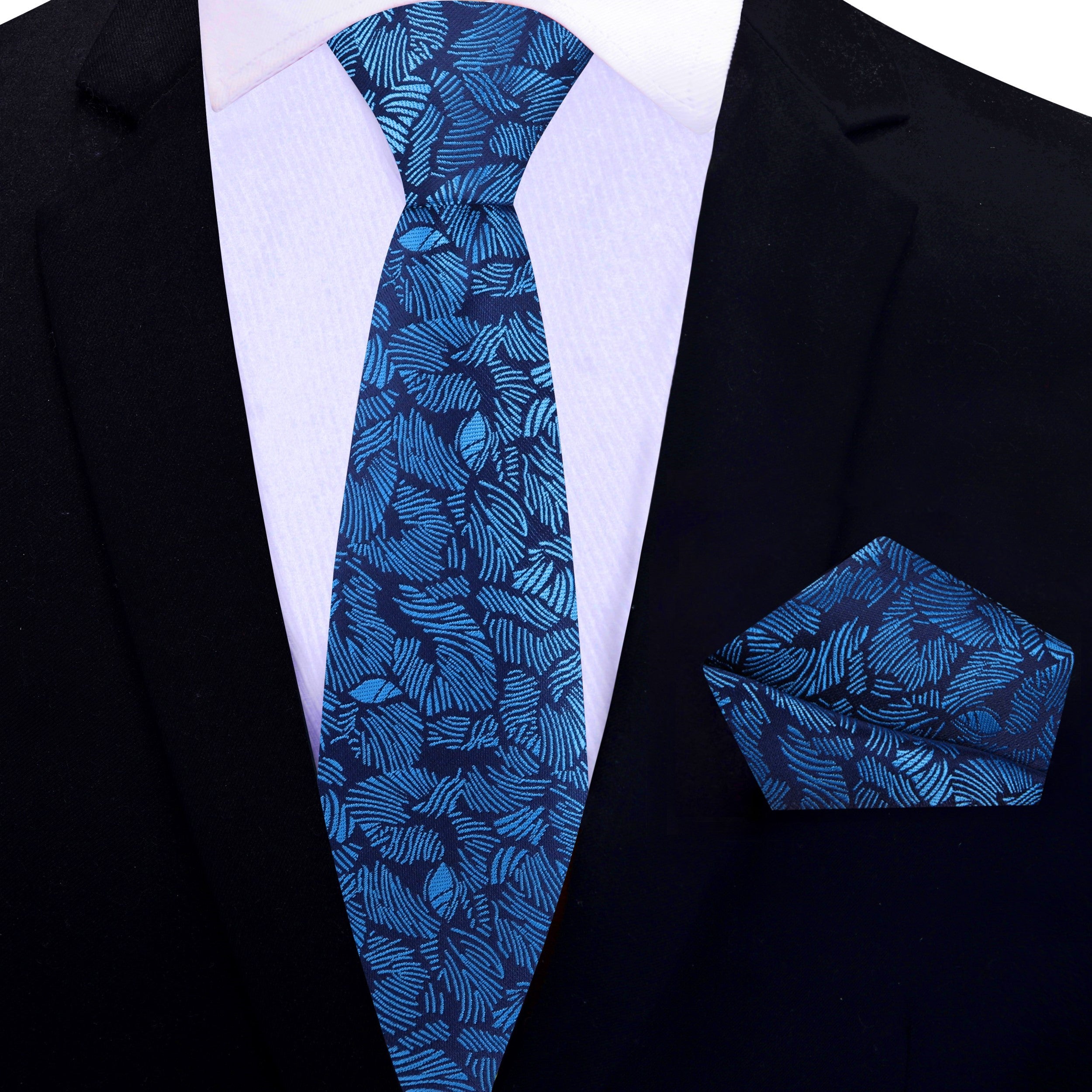 Close-up of tropical patterned mens tie in vibrant blue colors
