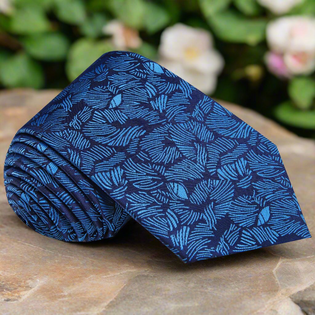 Light blue palm leaf tie for weddings with a navy suit