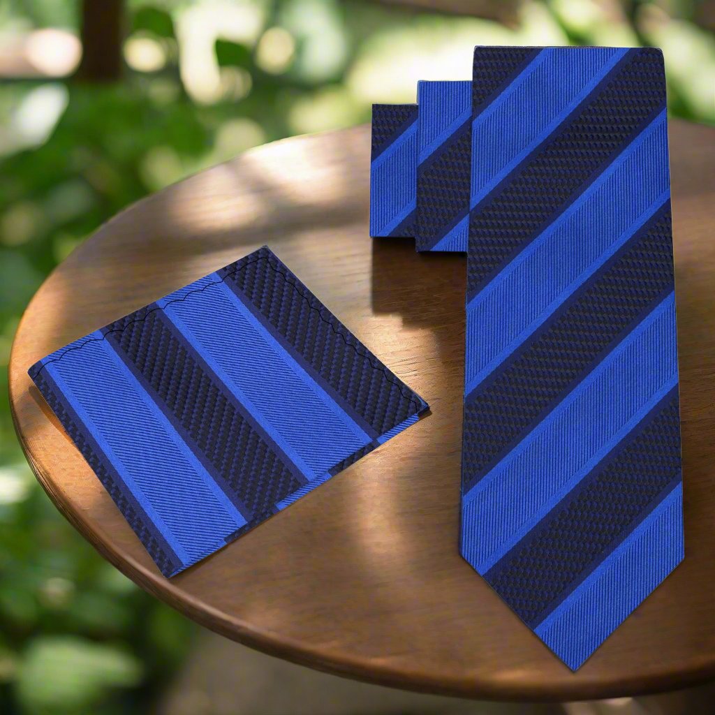 Close-up of classic striped silk necktie in blue and gold shades for business attire