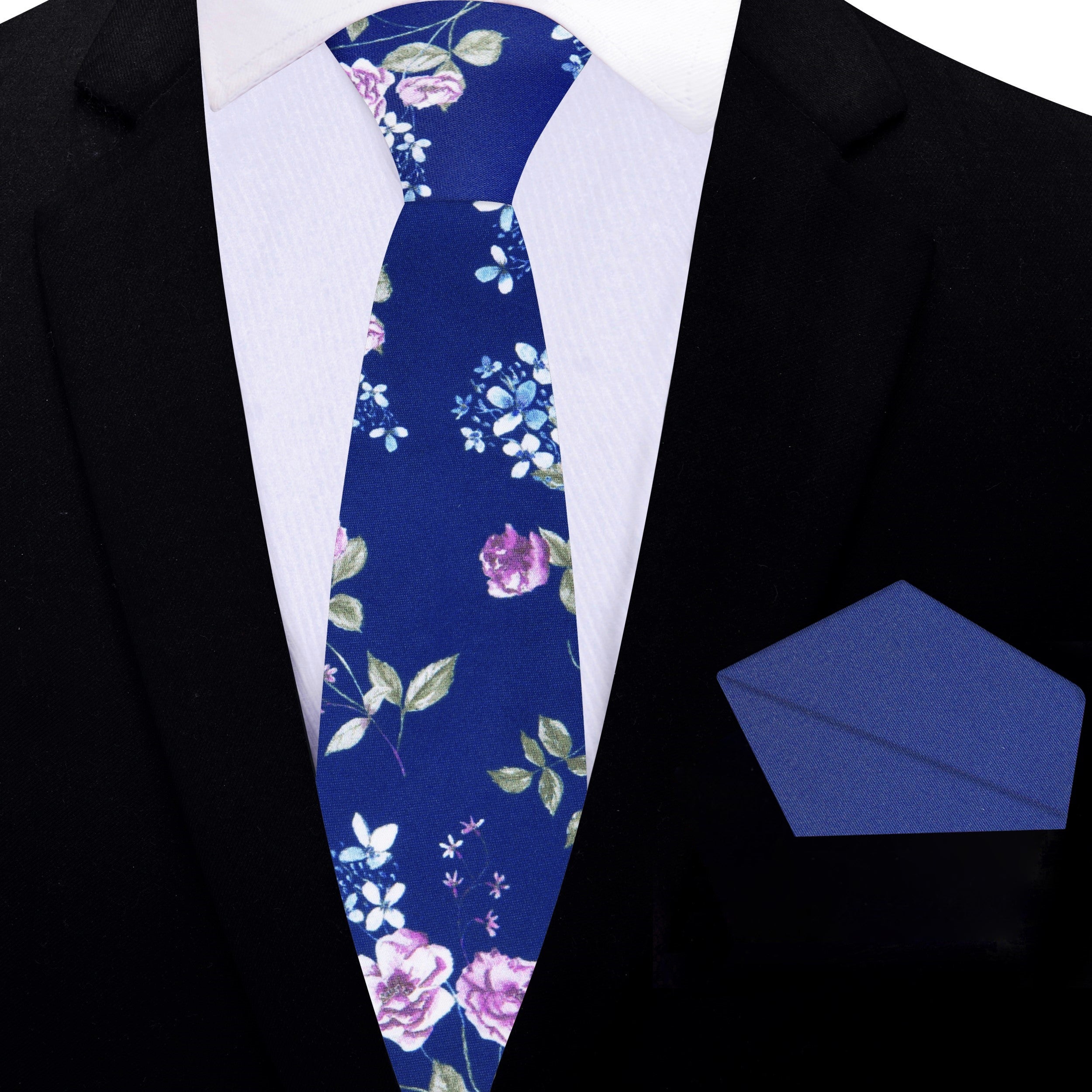 Detailed view of a floral silk tie showcasing vibrant colors and pattern