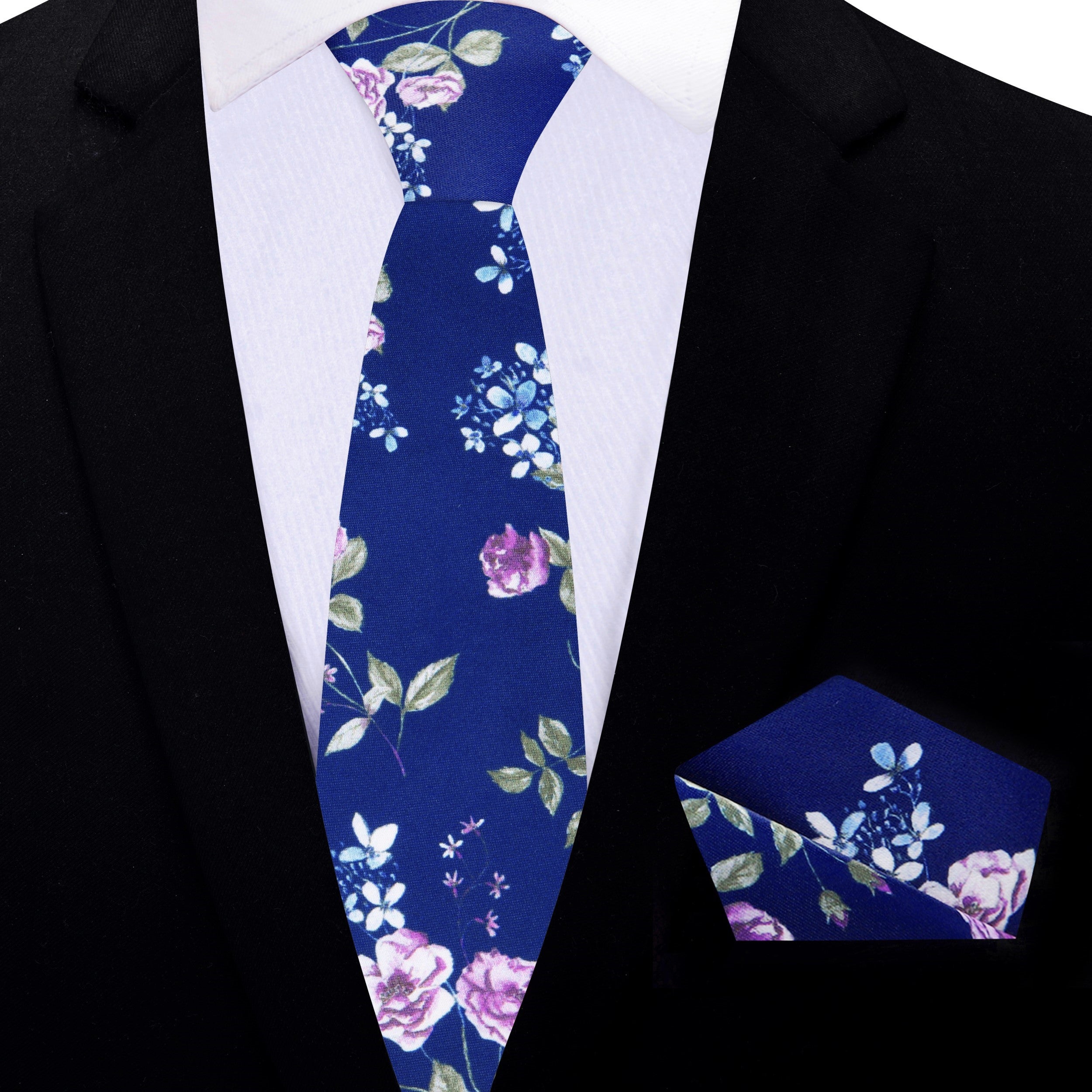 Detailed view of a floral silk tie showcasing vibrant colors and pattern