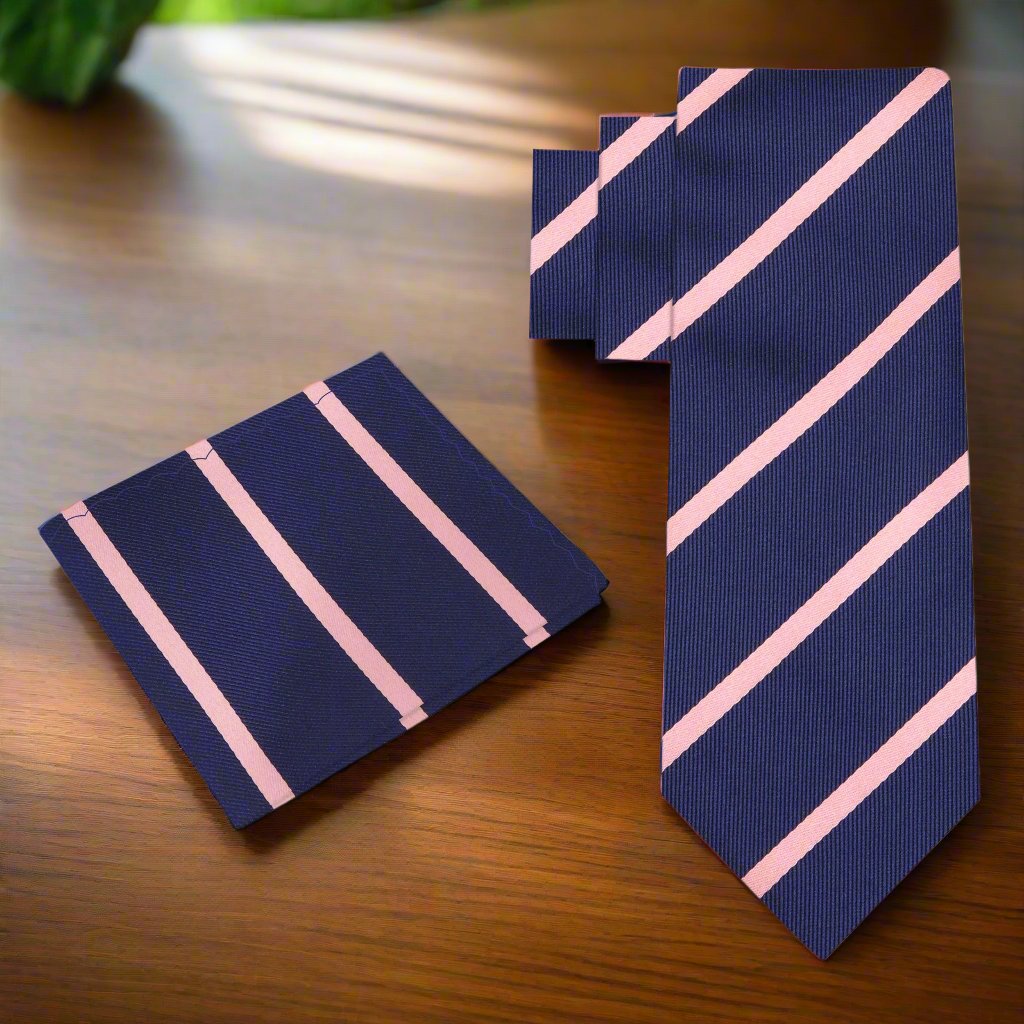 Elegant blue and pink striped silk necktie displayed elegantly on a white background.