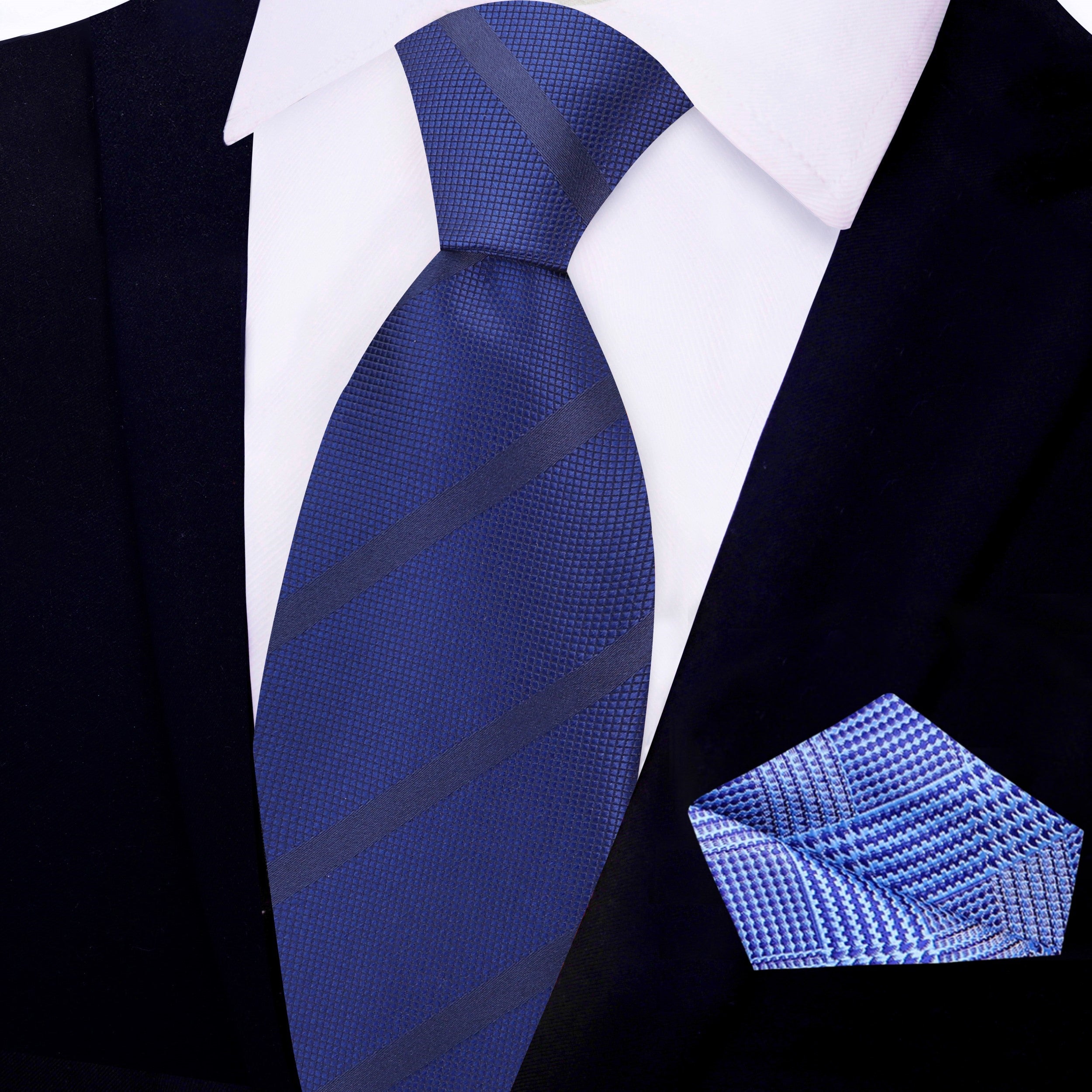 Man wearing a deep navy silk necktie with a white dress shirt at a wedding reception