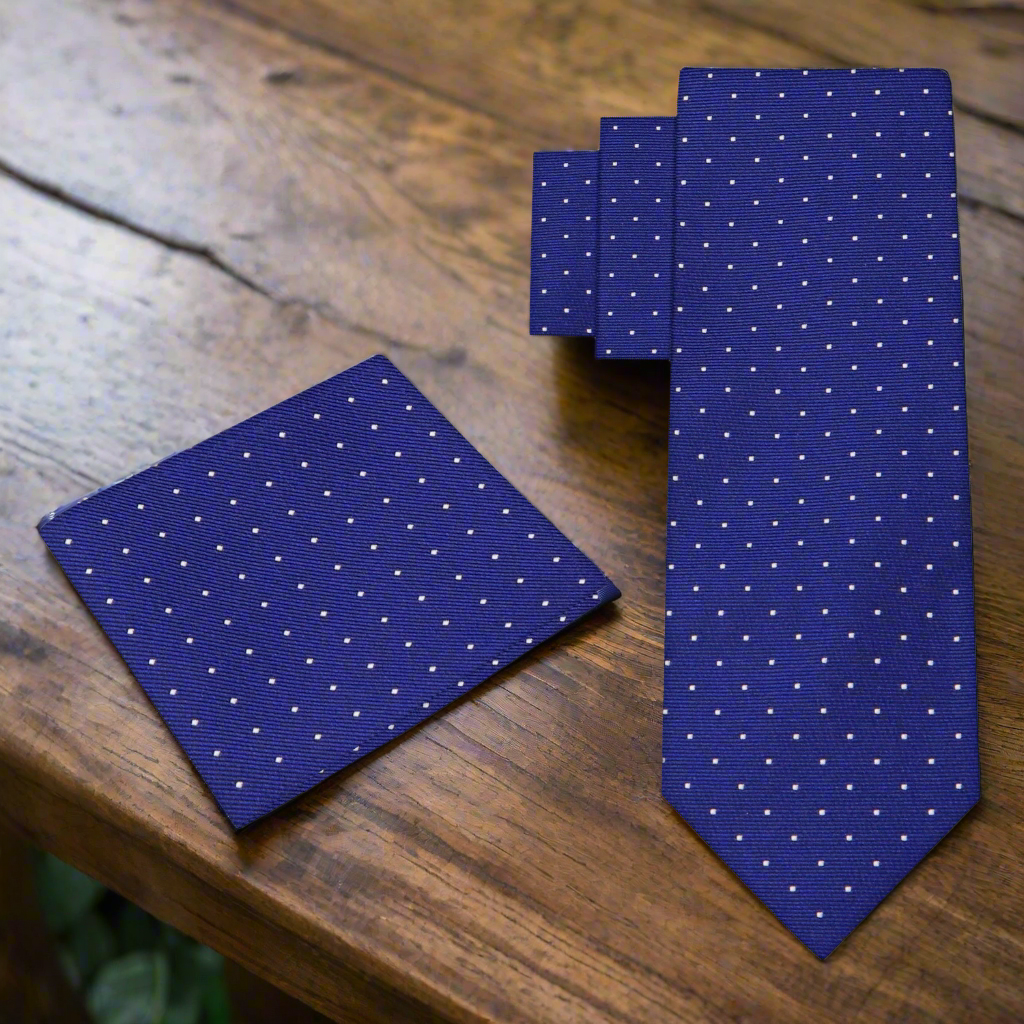 Close-up of Dunhaven micro dot necktie showing silk texture and white dot pattern, ideal for formal wear.