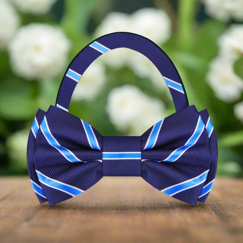 Detailed shot of a silk bow tie with vibrant red and blue stripes, ideal for parties
