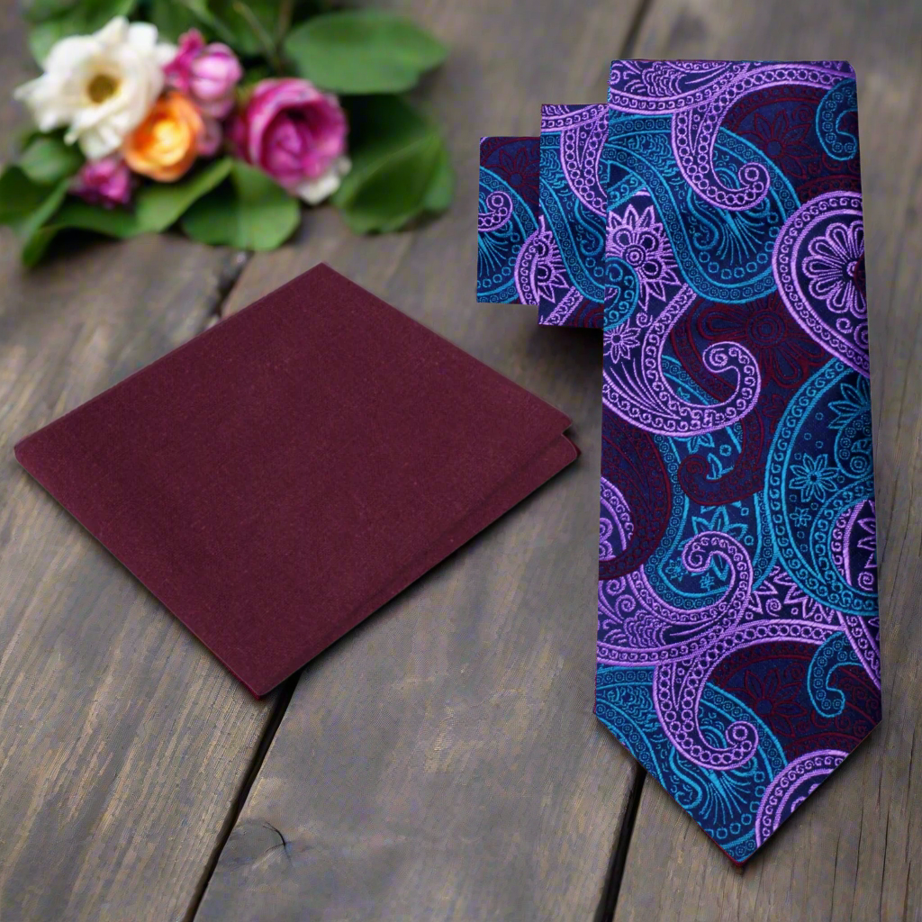 Close-up of purple paisley silk necktie showcasing intricate pattern