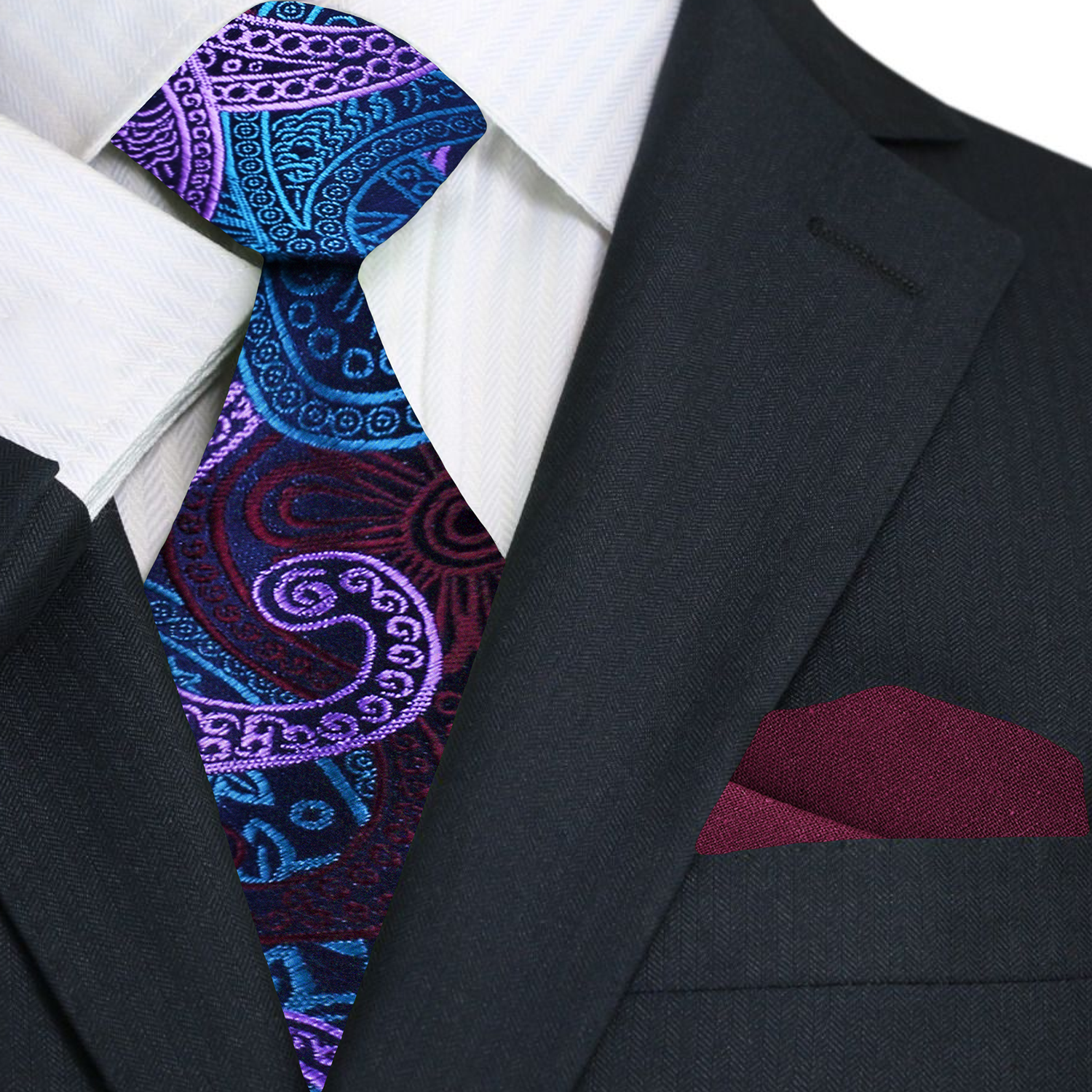 Model wearing purple paisley tie with white dress shirt at wedding