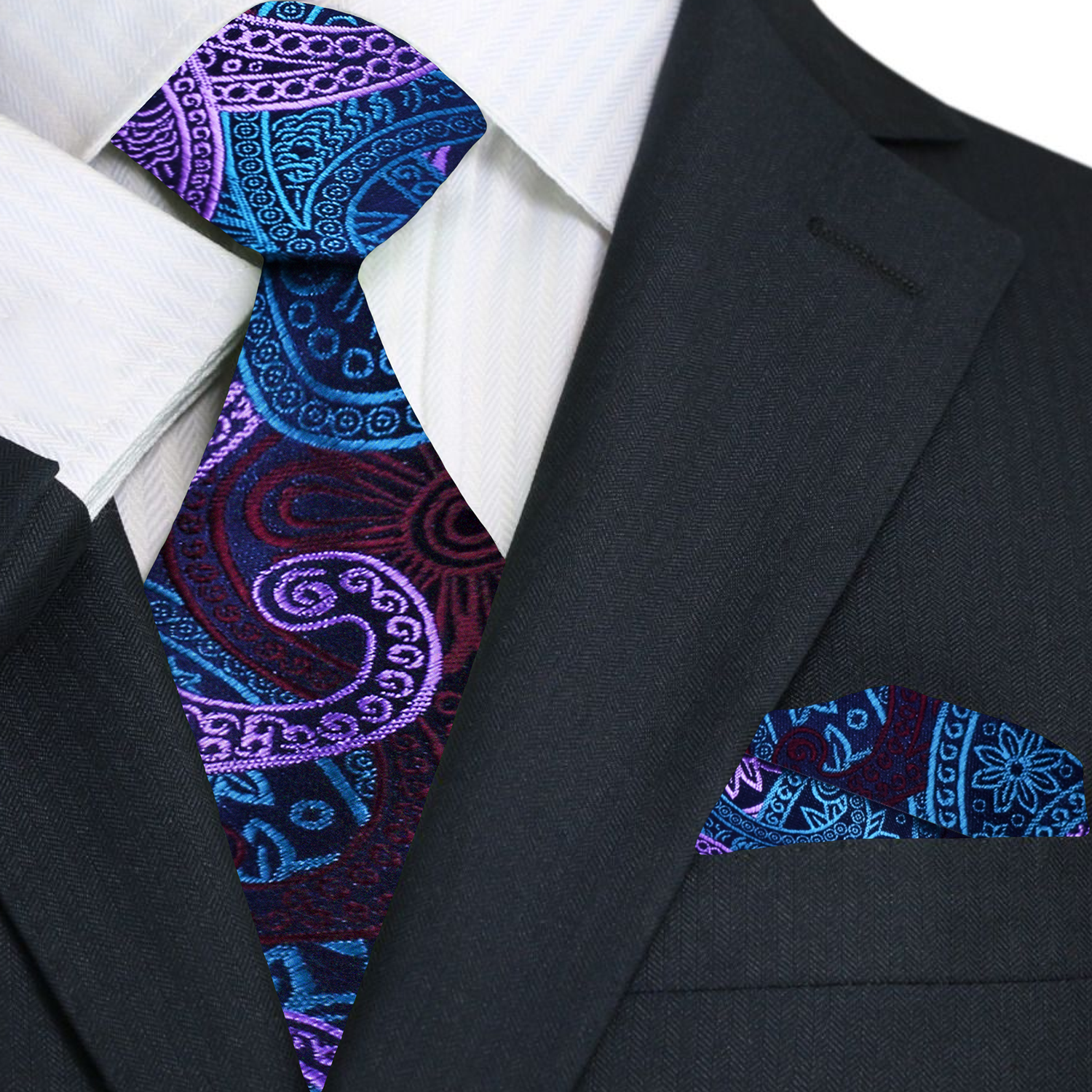 Model wearing purple paisley tie with white dress shirt at wedding