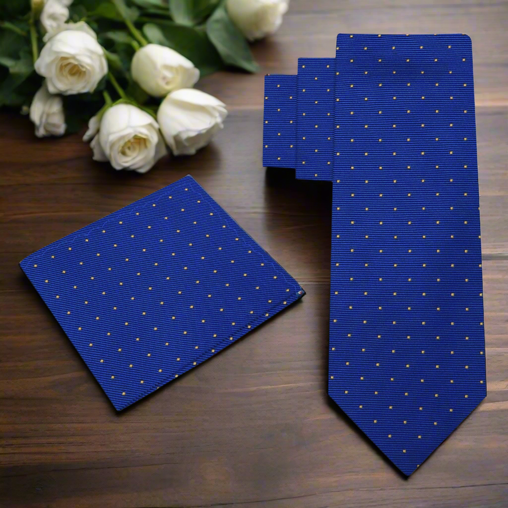 Elegant polka dot tie displayed on a hanger with a matching pocket square for a complete look