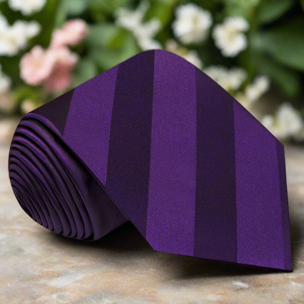Close-up of Sterndale stripe necktie showcasing the purple silk fabric and stripe pattern, perfect for weddings.