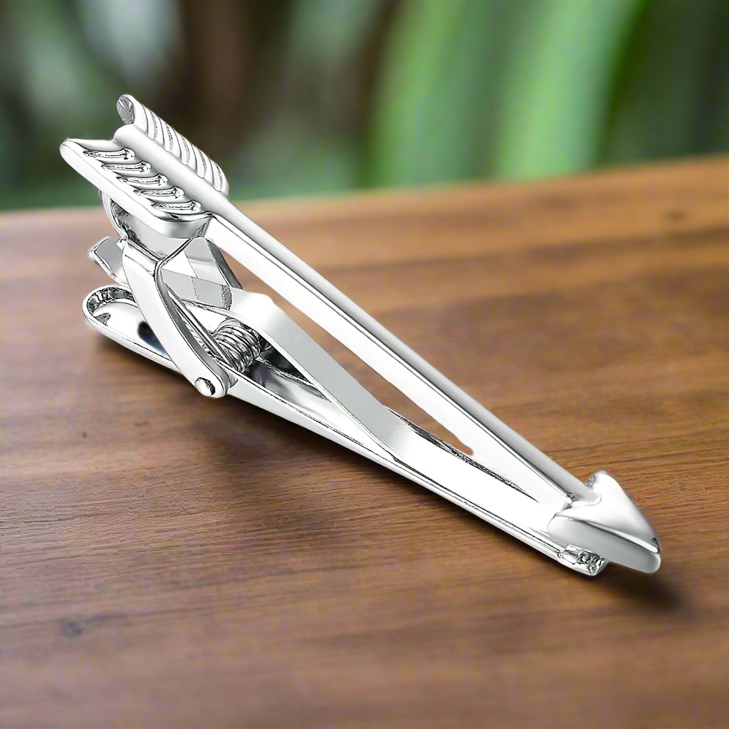 Close-up view of the Arrow-Themed Premium Tie Bar in gold, showcasing its intricate design and shine.