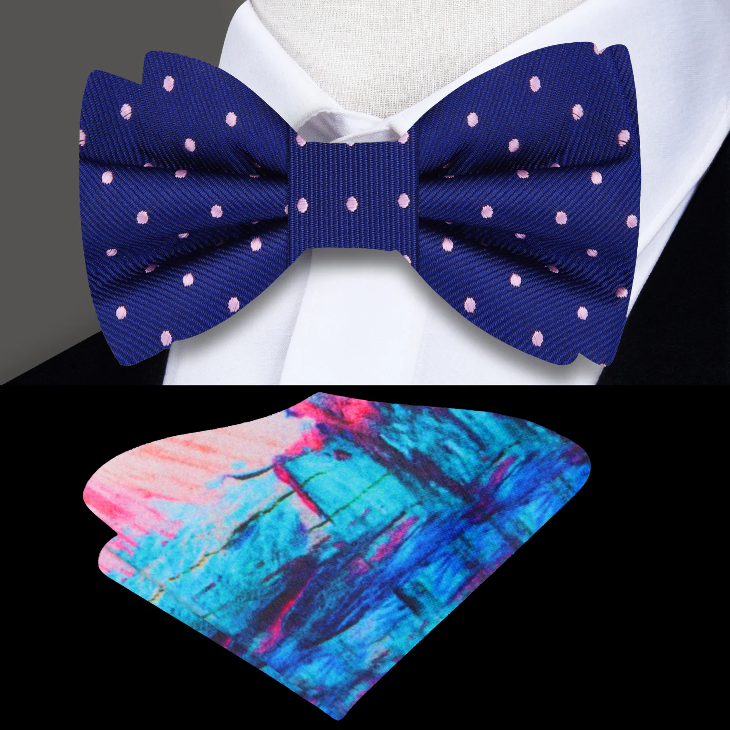 Close-up of blue polka dot bow tie with pink dots, suitable for weddings