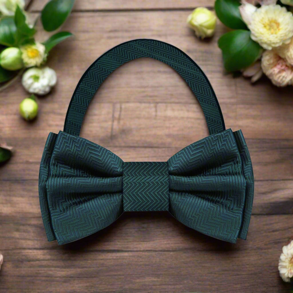Model wearing a mint green bow tie paired with a white dress shirt, ideal for spring garden parties.