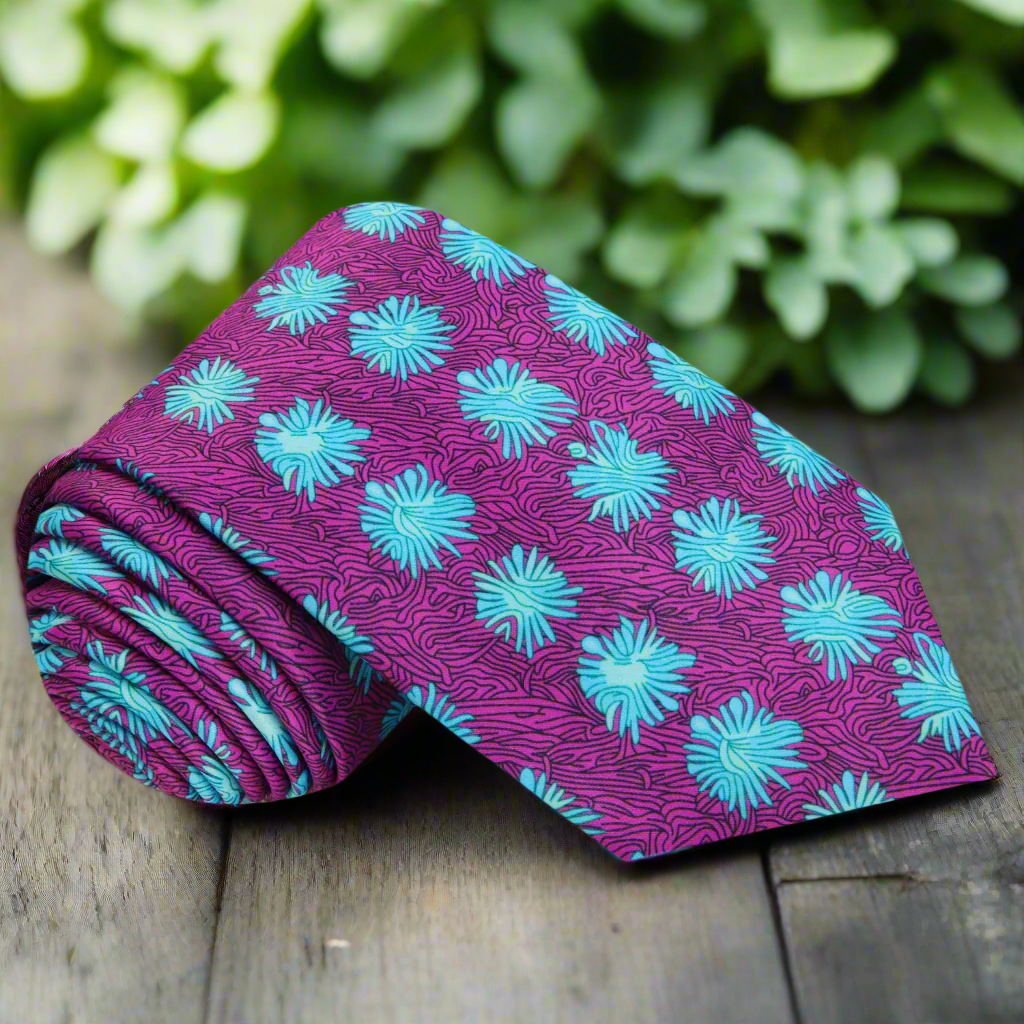 Close-up of Synapse abstract silk necktie in pink and blue with detailed pattern
