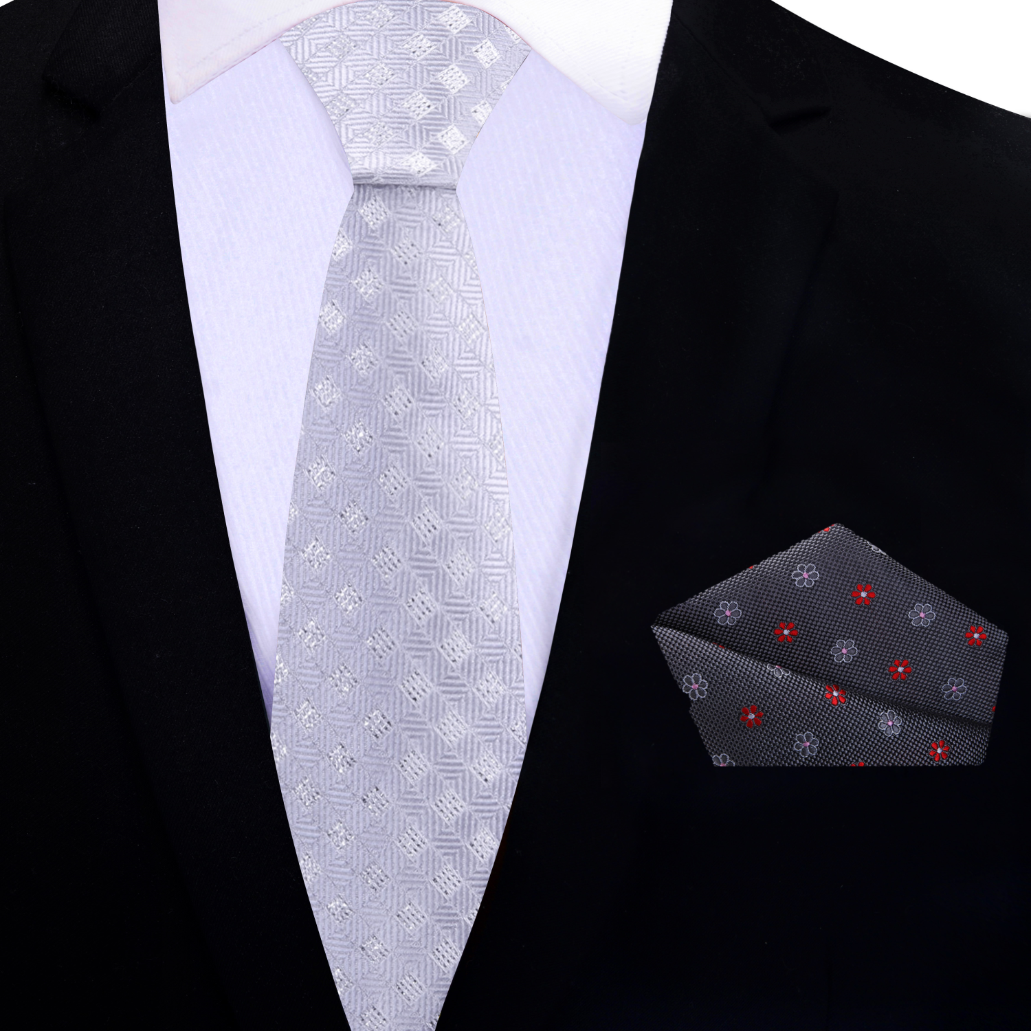 Man wearing a geometric silk tie at a formal event