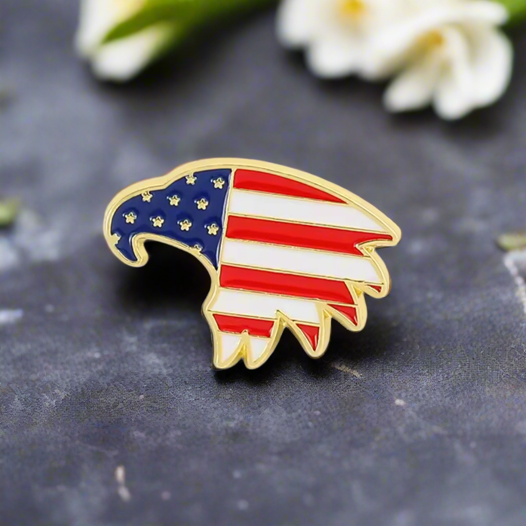 Eagle American flag lapel pin pinned to a formal suit for patriotic celebration