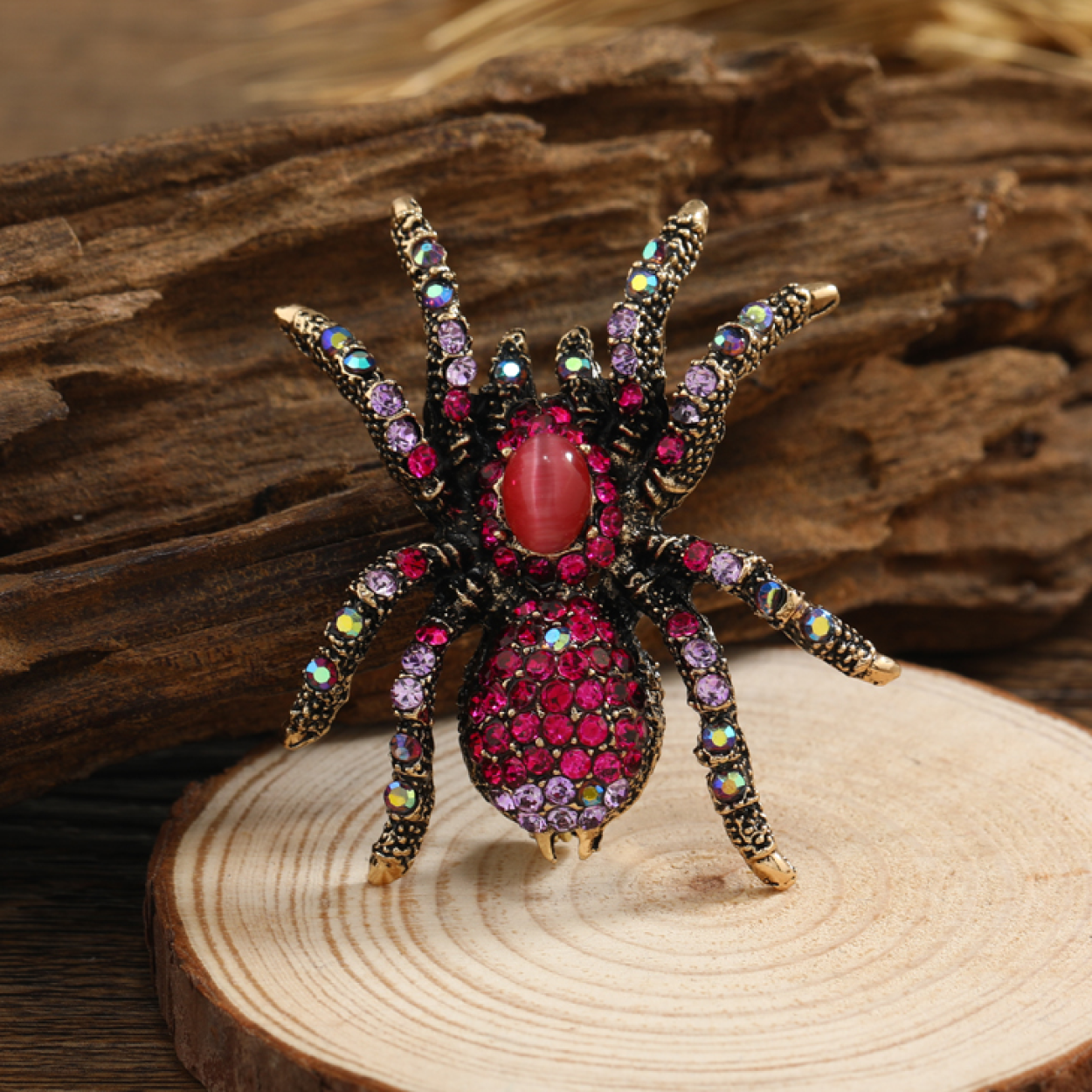 Fashionable spider brooch with glass stones, suitable as a mens suit accessory