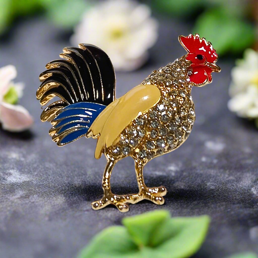 Detailed view of the rooster lapel pin with colorful gemstones