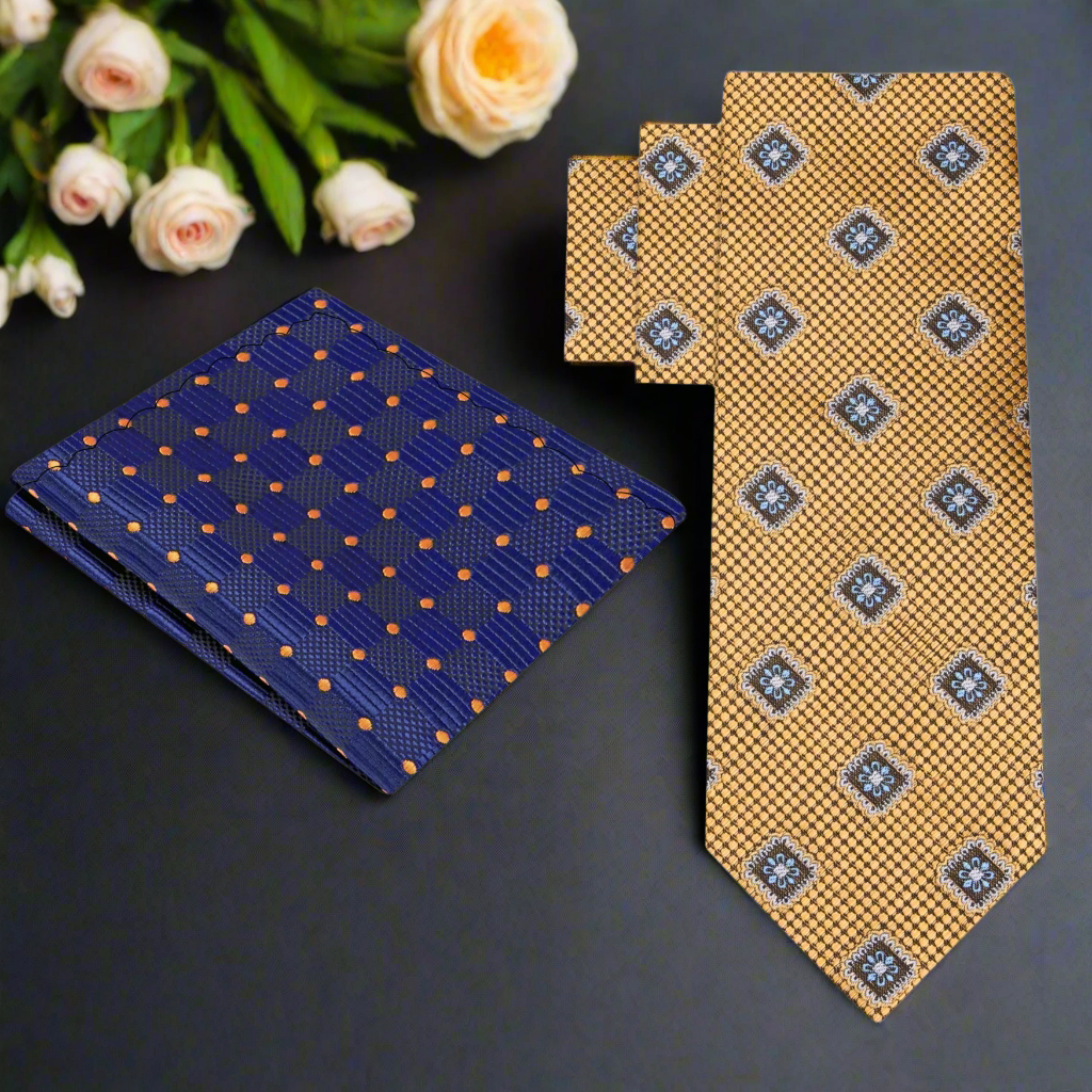 Front view of the Elegant Gold Medallion Necktie featuring geometric patterns in black and blue.