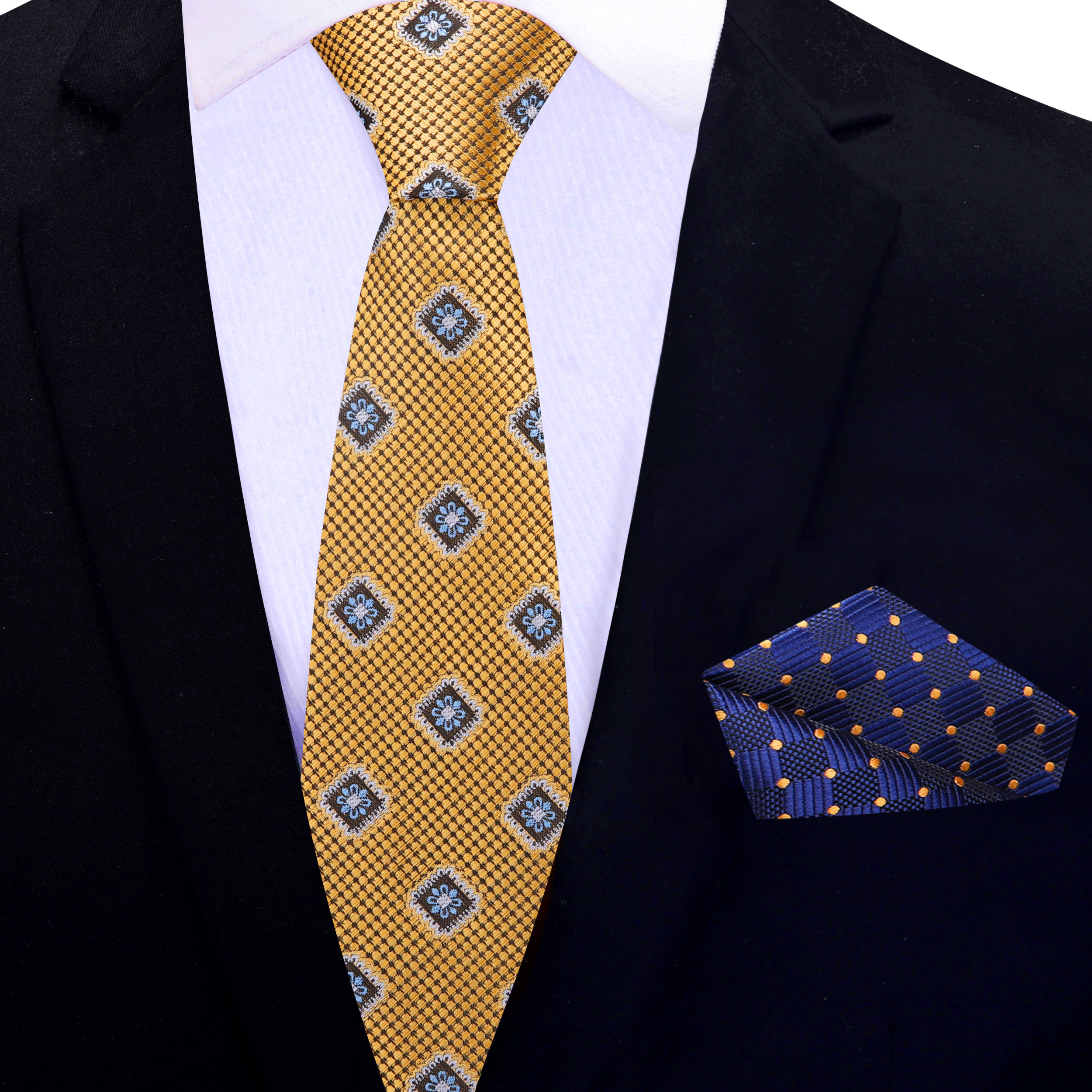 Stylish display of the gold necktie paired with a classic white dress shirt and navy suit.