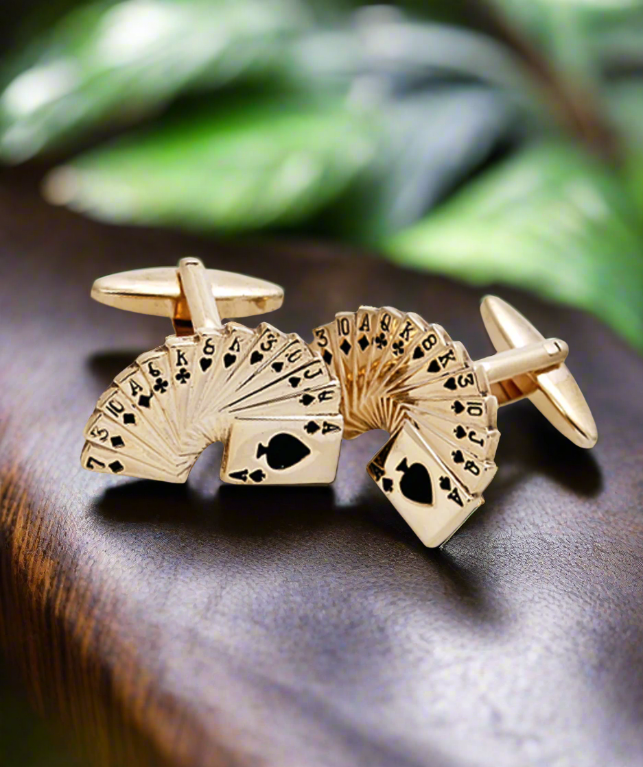 Man wearing gaming themed cufflinks during a casino night event