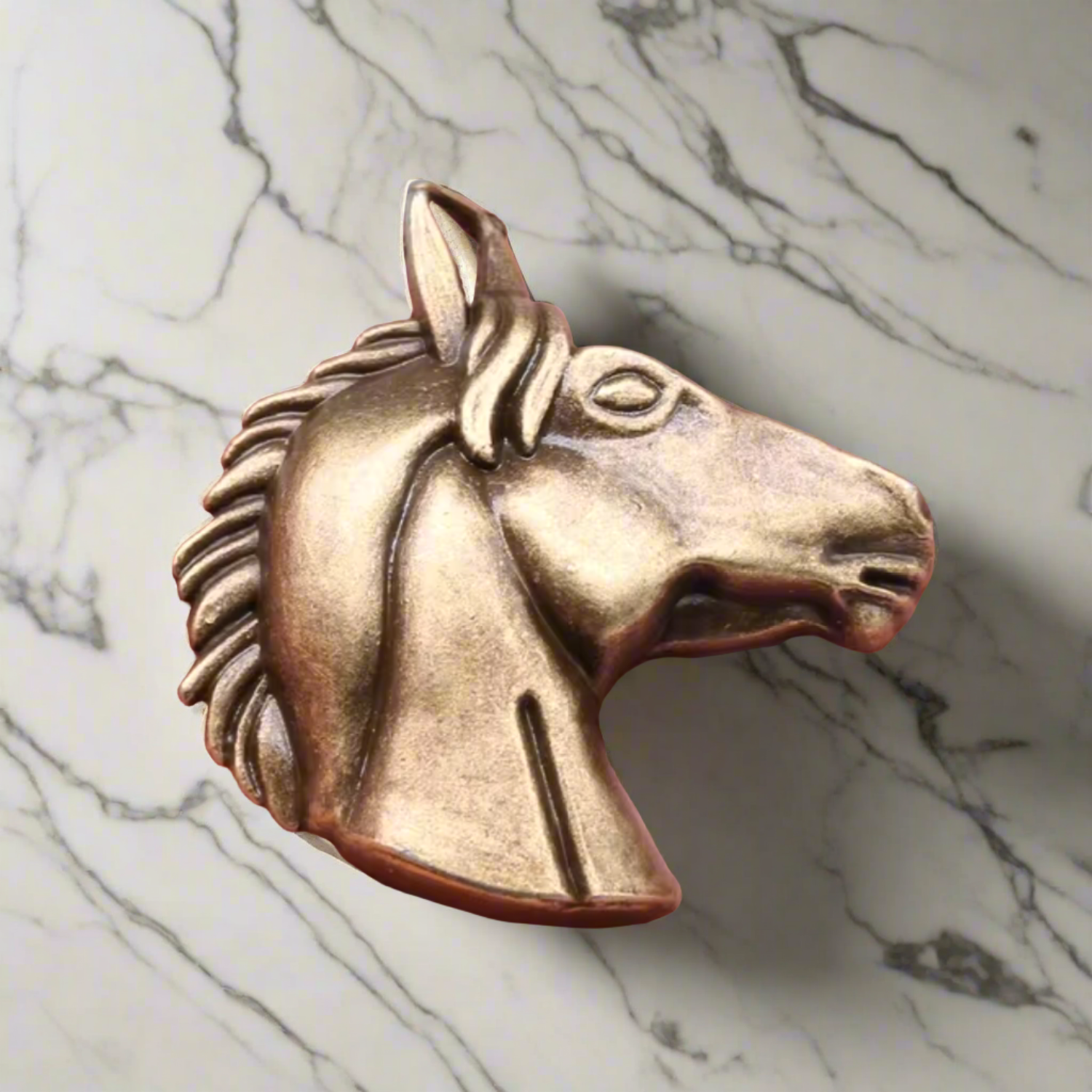 Elegant horse head lapel pin on a navy suit, perfect for formal events.