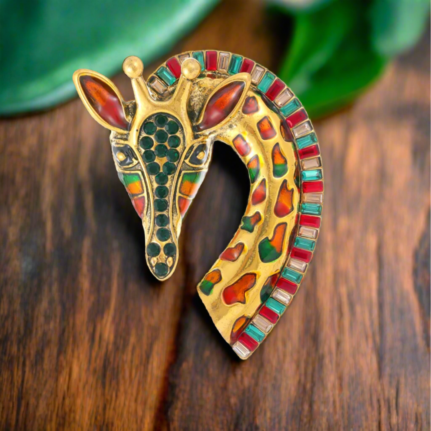 Whimsical Giraffe Rhinestone Lapel Pin displayed on a jacket
