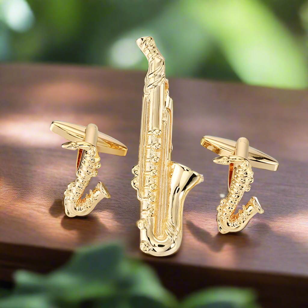 Luxury saxophone cufflinks gift set displayed on a velvet background