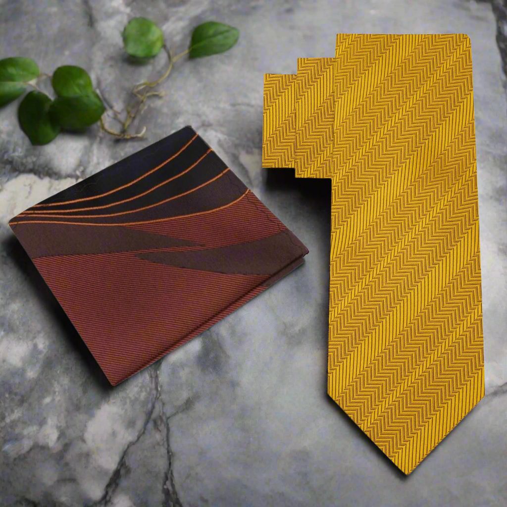 Close-up of luxurious golden amber silk necktie with polished finish.